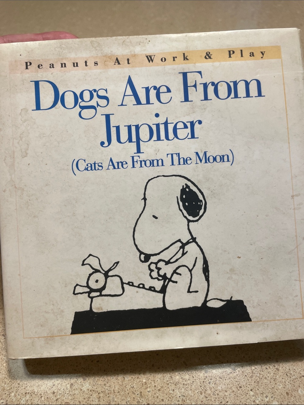 Peanuts Dogs Are From Jupiter Hardcover — White, Black, Blue